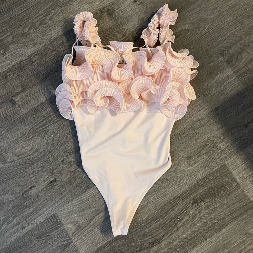 NWOT one piece light pink, M